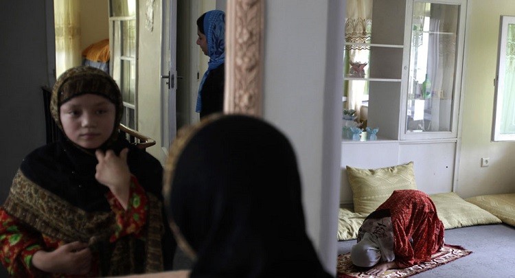 Women in Aphganistan.Reuters.Lucy Nicholson